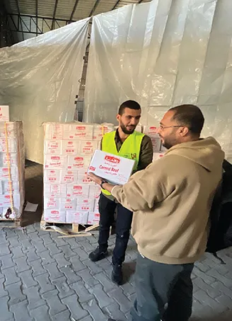 The second phase of distributing canned meat to families in northern Gaza